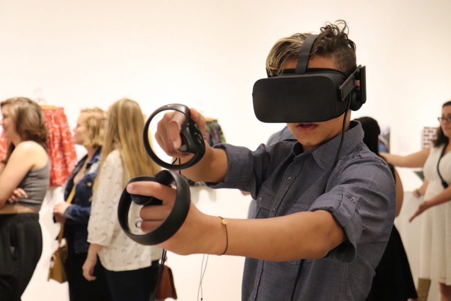 Those in attendance at the Digital Arts reception had the opportunity to engage in several student works, including a VR set-up by Alex Ramirez.