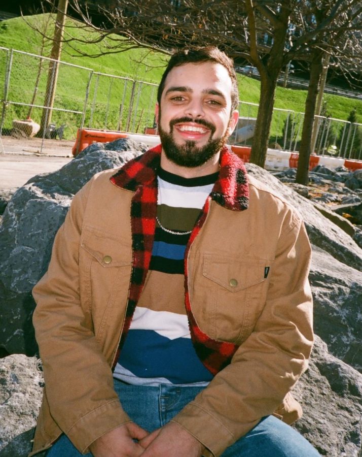 Pictured is Sam Hadelman, who is now a full-time graduate student at Fordham University in New York City. While here he is in front of the lens, Hadelman is usually behind the camera at vennues all around New York, photographing shows and artists. Photo courtesy of Sam Hadelman.